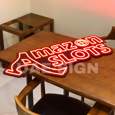 AMAZON SLOTS' NEON SIGN