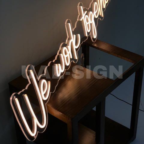 WE WORK TOGETHER' NEON SIGN