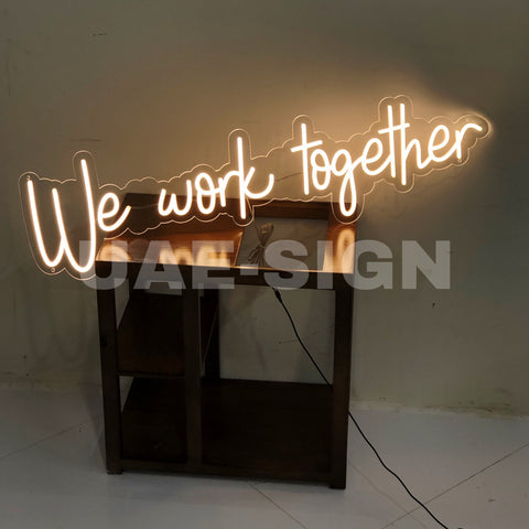 WE WORK TOGETHER' NEON SIGN