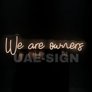 WE ARE OWNERS' NEON SIGN